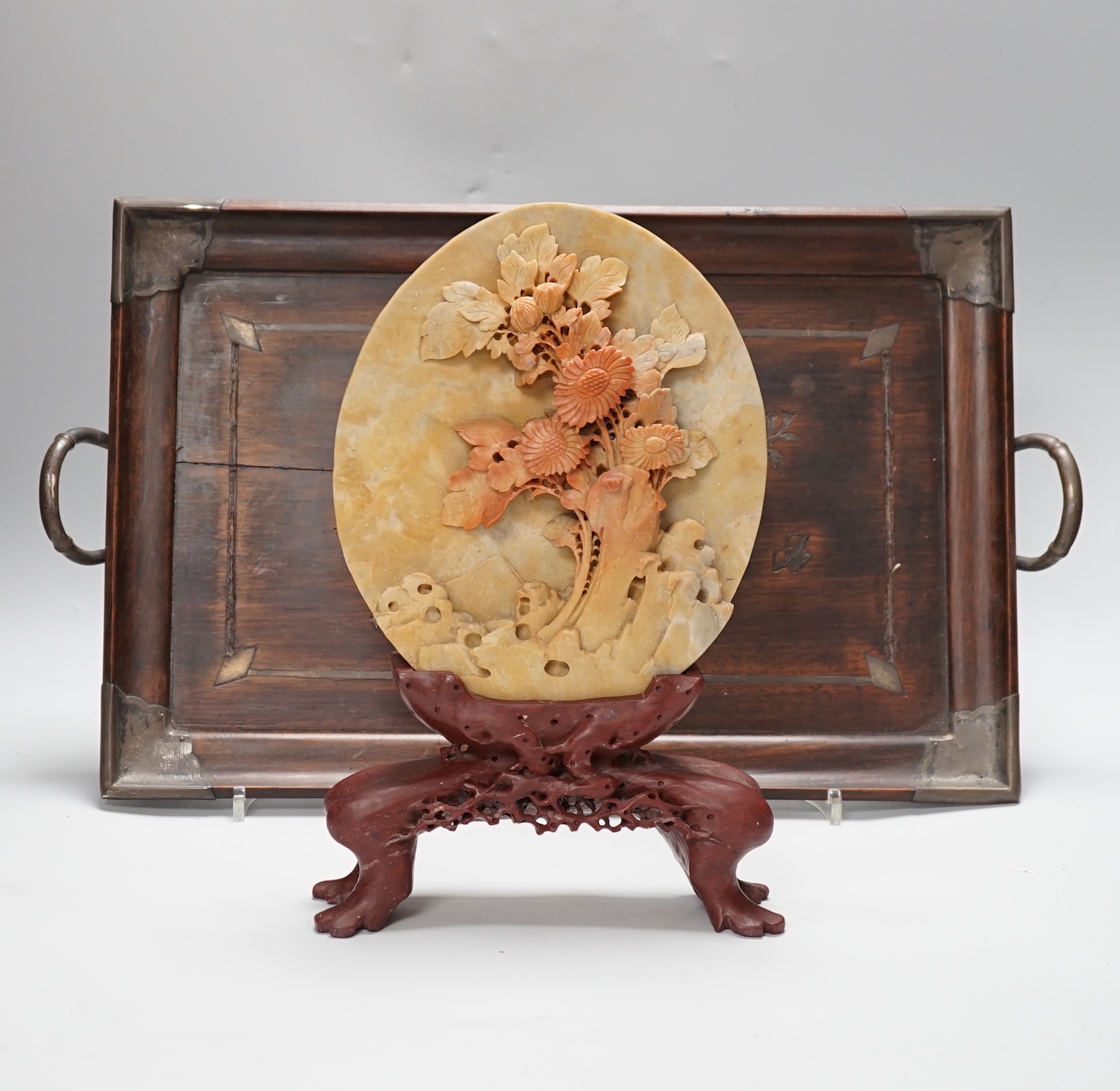 A Chinese white metal wall mounted hongmu tray and a Chinese carved soapstone table screen on stand, tray 44cm x 29.5cm